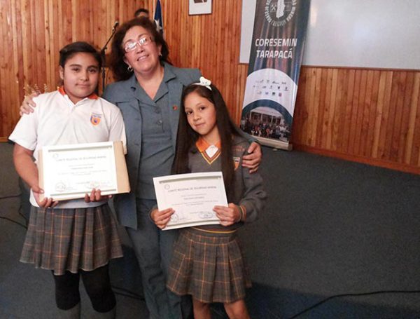 Students from Colegio Nazaret win 1st and 2nd place in CORESEMIN painting competition.